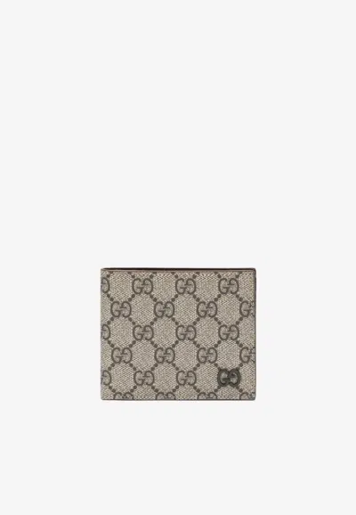 Gucci Gg Supreme Bi-fold Wallet In Sand