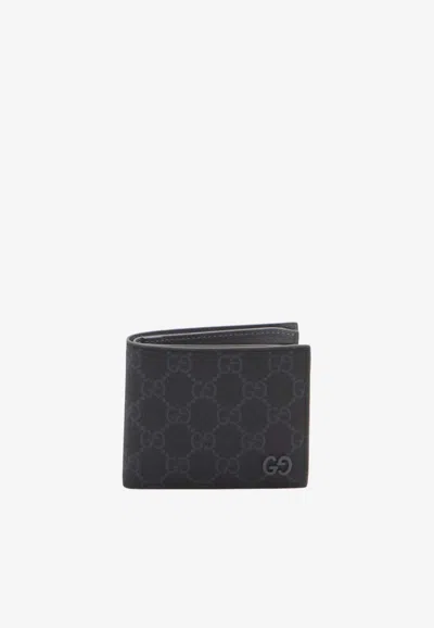 Gucci Gg Supreme Bi-fold Wallet In Black