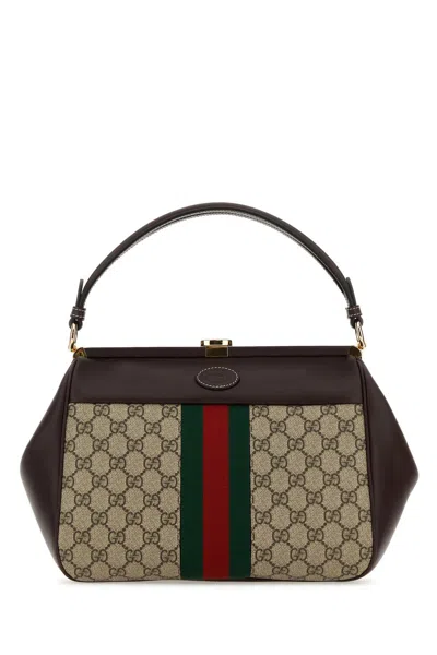 Gucci Gg Supreme Fabric And Leather Handbag In Brown