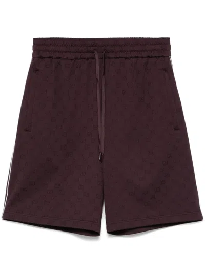 Gucci Gg Supreme-jacquard Shorts In 红色