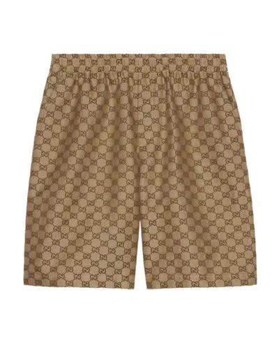 Gucci Shorts Aus Gg Supreme-leinen In Brown