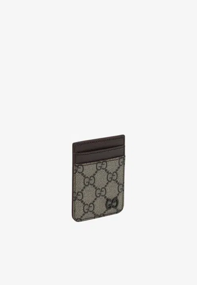 Gucci Gg Supreme Magnetic Cardholder In Brown