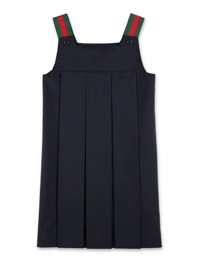 Gucci Girl Pleated Pinafore Dress In Blue