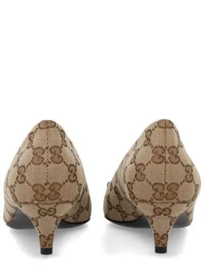Gucci Gold-tone Clamp Canvas Pumps In Nude