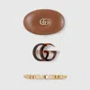 Gucci Hair Clip Set In Brown
