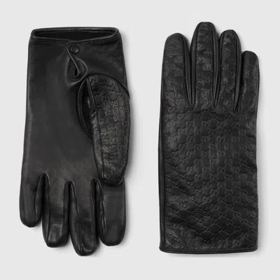 Gucci Embossed Gg Leather Gloves In Black