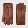 Gucci Embossed Gg Leather Gloves In Brown