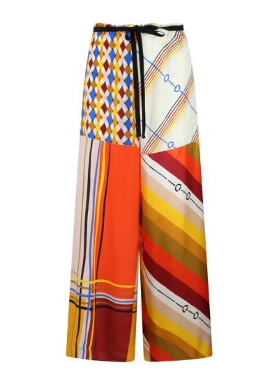 Gucci Heritage Patchwork Printed Trousers In Multicolour