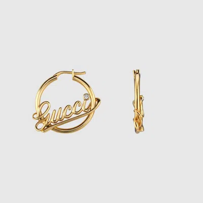 Gucci Hoop Earrings With  Script In Gold-toned Metal