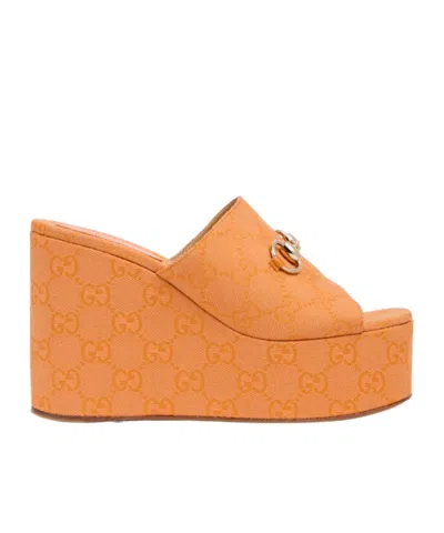 Gucci Horsebit Detailed Slip-on Wedged Mules In Orange