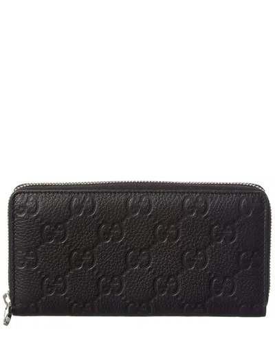 Gucci Imprint Leather Zip Around Wallet In Black