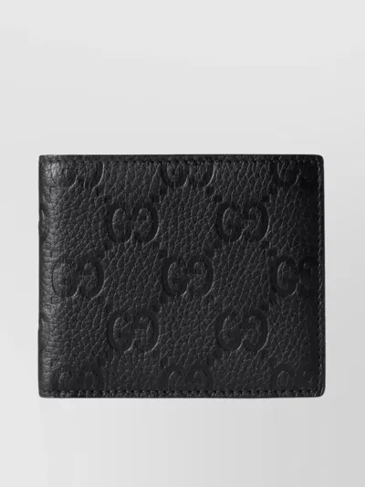Gucci Imprint Textured Leather Bi-fold Wallet In Black