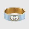 Gucci Interlocking Enamel Cuff Bracelet In Gold