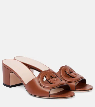 Gucci Cutout Leather Mules In Brown