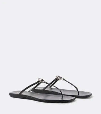 Gucci Interlocking G Leather Thong Sandals In Black