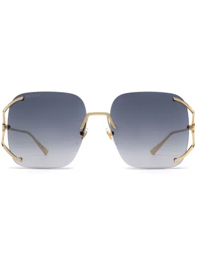 Gucci Interlocking G Sunglasses In Gold