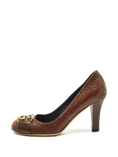 Pre-owned Gucci Interlocking Gg Logo Embossed Leather Pumps In Brown