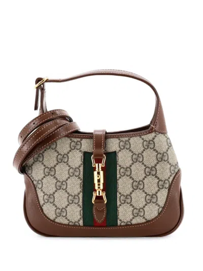 Pre-owned Gucci Jackie 1961 Gg Coated Canvas Mini Hobo Bag In Brown