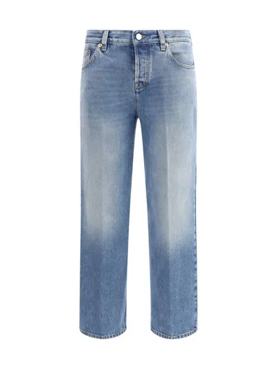 Gucci Blue Jeans With Logo Patch On The Rear And Faded Effect In Denim Woman