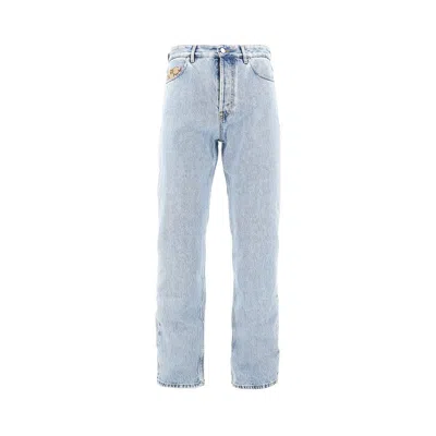 Gucci Jeans With Gg Fabric Inserts In Blue