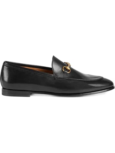 Gucci Jet Black Leather Loafers With Gold-tone Hardware And Signature Horsebit Detail