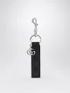 Gucci Logo Plaque Monogrammed Keychain In Black