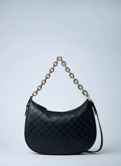 GUCCI LARGE GG EMBLEM SHOULDER BAG