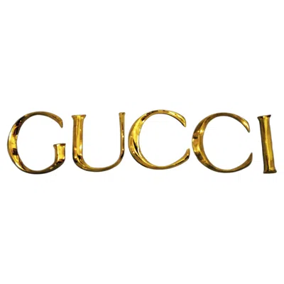 Pre-owned Gucci Late 20th Century Decorative Wall Ornament  Letters Made In Golden Brass In Brown