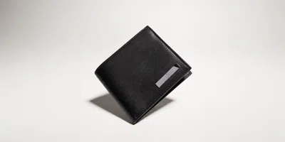 Gucci Leather Bifold Metal Accent Wallet In Black