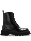 Gucci Thea Lug Sole Boots In Black Leather In Black