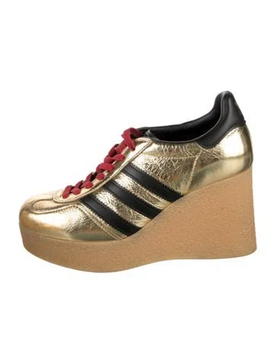 Pre-owned Gucci Leather Graphic Print Wedge Sneakers In Gold