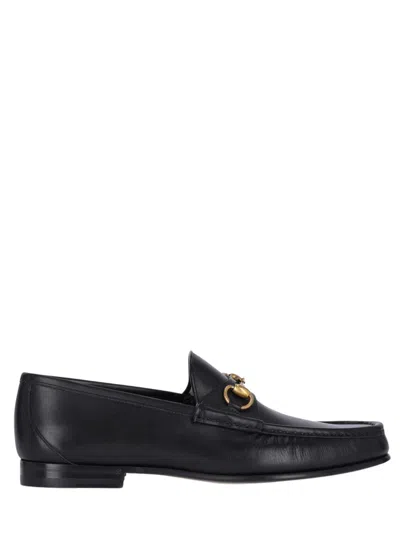 Gucci Leather Loafers With Front Clamp Detail And Gold-tone Heel Hardware For Men In Black
