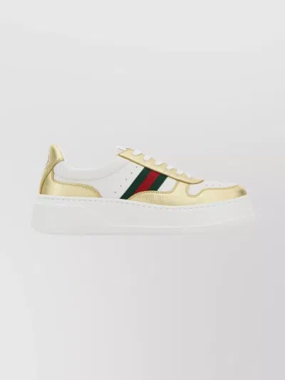 Gucci Leather Sneakers With Gold Accents And Perforations
