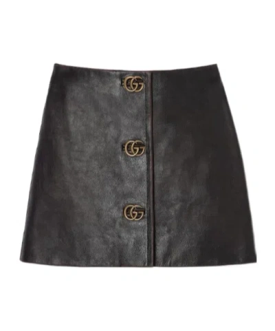 Gucci Gg Embellished Leather Mini Skirt In Black