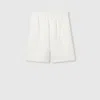 Gucci Linen Shorts With Embossed Logo In White