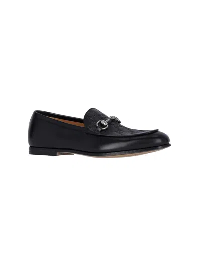 Gucci Loafers With Clamp In Black