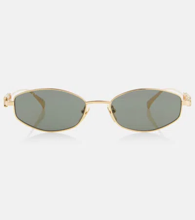 Gucci Logo Embellished Oval Sunglasses In Gold