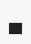 Gucci Logo Embossed Grained Leather Bi-fold Wallet In Black