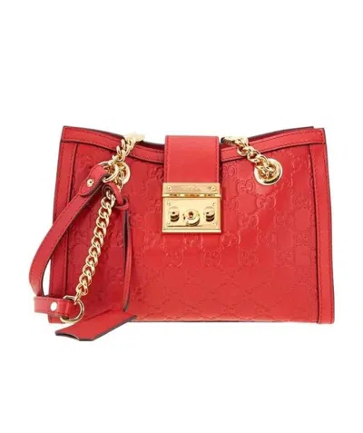 Gucci Logo Embossed Shoulder Bag In Red