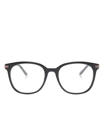 Gucci Engraved-logo Round-frame Glasses In Black