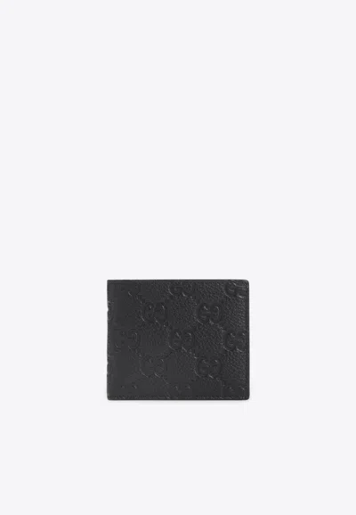 Gucci Logo Imprint Bi-fold Wallet In Black