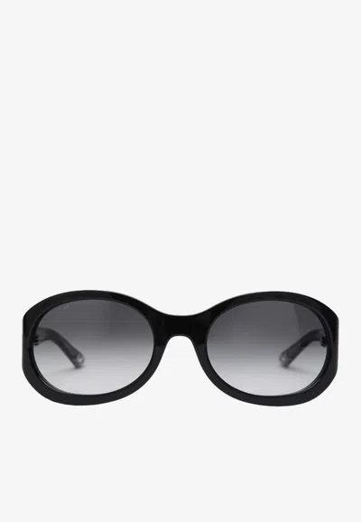 Gucci Logo Oval Sunglasses In Gray