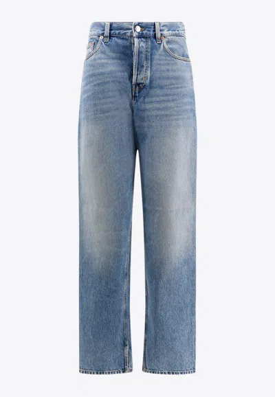 Gucci Logo Patch Faded Jeans In Blue