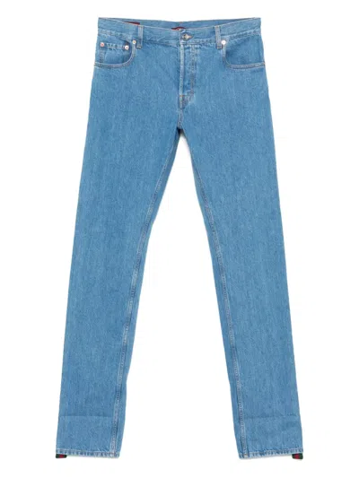 Gucci Blue Jeans With Logo Patch On The Rear And Web Turn-up Hem In Denim Man
