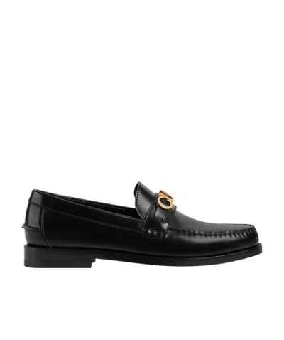 GUCCI LOGO-PLAQUE LEATHER LOAFERS
