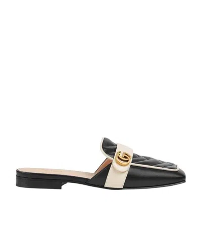 Gucci Logo Plaque Quilted Mules In Black