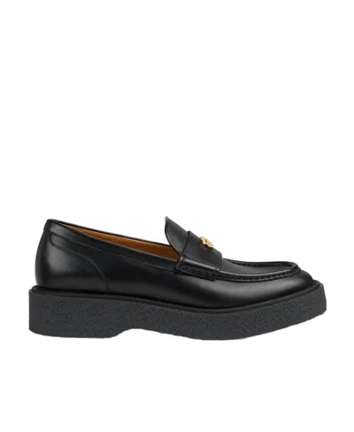 Gucci Logo Plaque Slip-on Loafers In Black