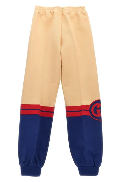 Gucci Logo Print Joggers In Neutral