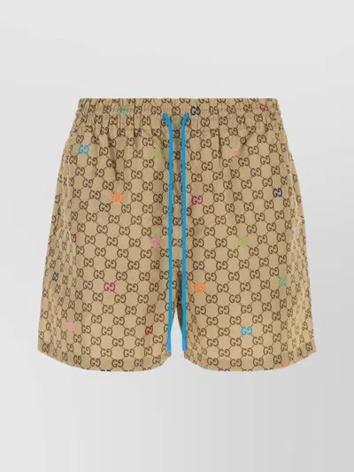 Gucci Logo Print Swim Shorts In Neutral
