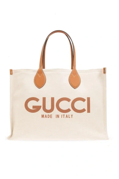 Gucci Logo Printed Top Handle Bag In Beige